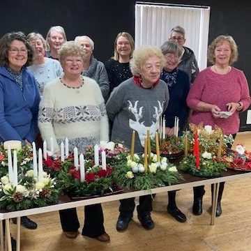 Southport u3a Floral Art group with their Christmas arrangements